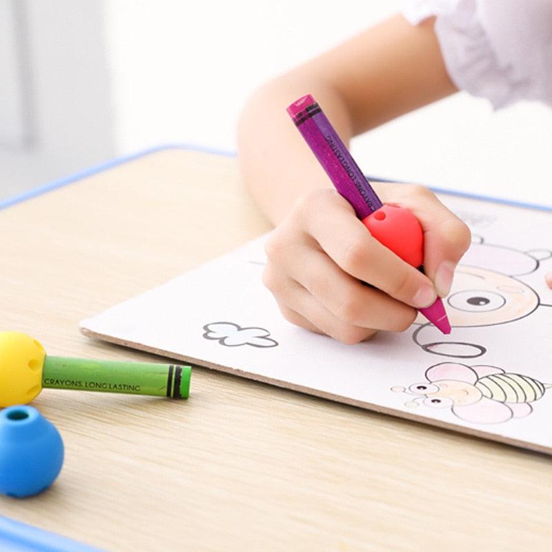 Set of 1-3 silicone pen grips from Stevvex in various colors, ergonomic design for children's and adults' writing practice.