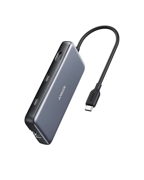 Anker 555 USB-C Hub charging only with multiple ports, compact design, and sleek black finish, shown from a side view.