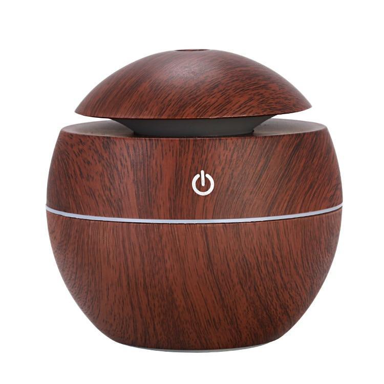 Stevvex 130ml USB ultrasonic aroma diffuser with cool mist, 7-color LED night light, suitable for office or home use.
