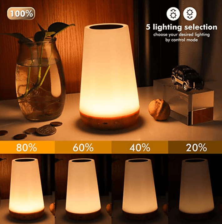 Stevvex Touch Lamp with RGB colors, dimmable warm white light, USB charging port, and sensor control for bedroom or office use.