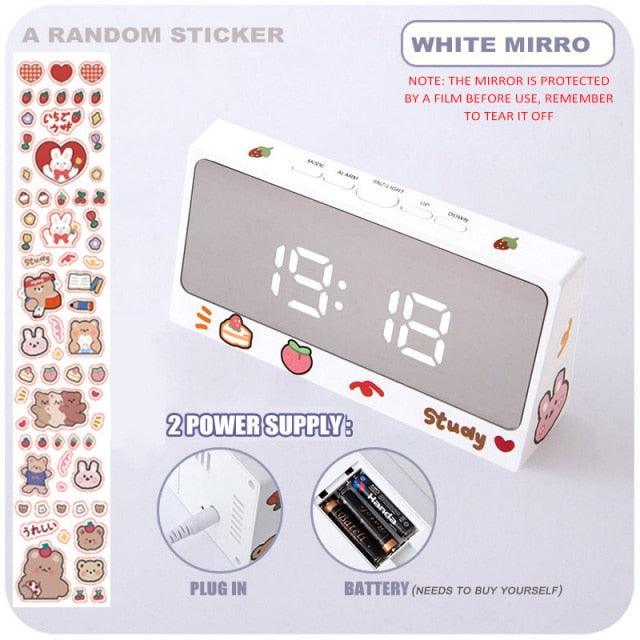 Stevvex digital table clock with LED display, snooze alarm, mirror surface, USB charger, and adjustable brightness for bedroom use.