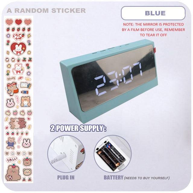 Stevvex digital table clock with LED display, snooze alarm, mirror surface, USB charger, and adjustable brightness for bedroom use.