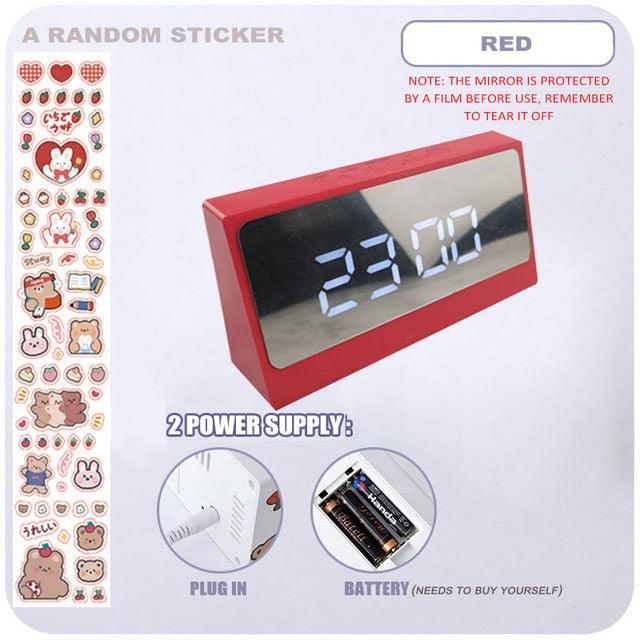 Stevvex digital table clock with snooze alarm, mirror surface, LED display, USB charger, adjustable brightness, for bedroom or desk use.