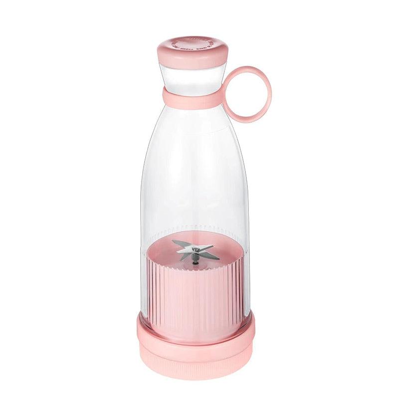 Stevvex portable electric blender with glass bottle, showing fresh fruit and citrus inside, USB rechargeable mini juicer and mixer.