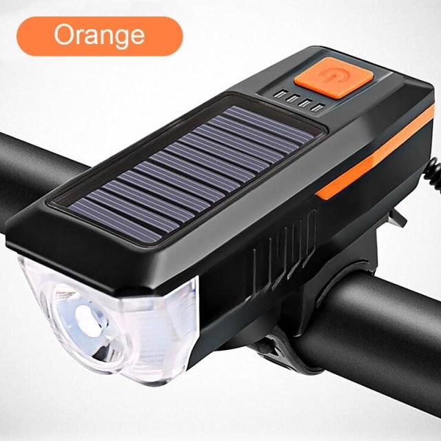 Stevvex solar-powered LED bicycle front light with waterproof design, rechargeable headlight, and integrated bell for mountain biking.