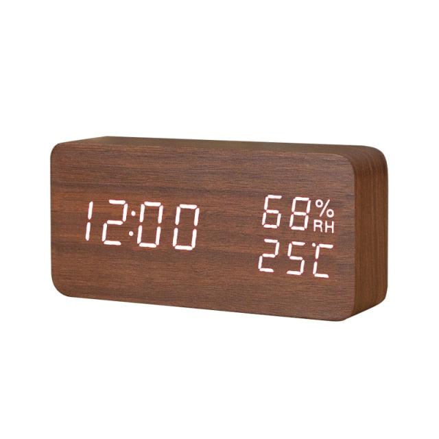Stevvex wooden digital alarm clock with LED display, wireless charging, three alarms, sound control, snooze, and voice activation.