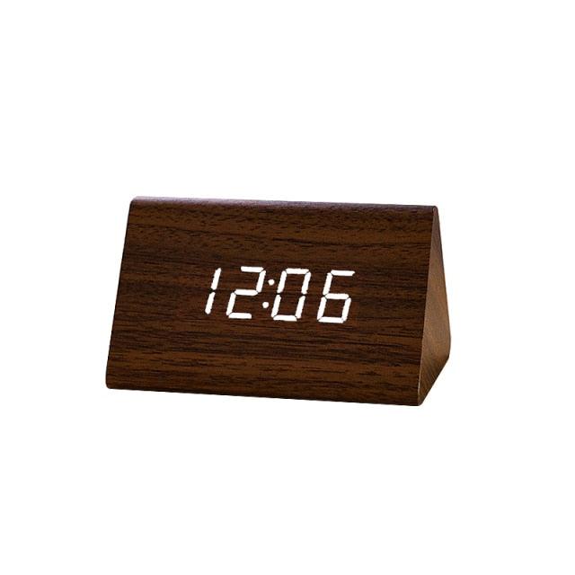 Stevvex USB/AAA powered LED digital wooden alarm clock with wireless charging, 3 alarms, LED display, sound control, and snooze.