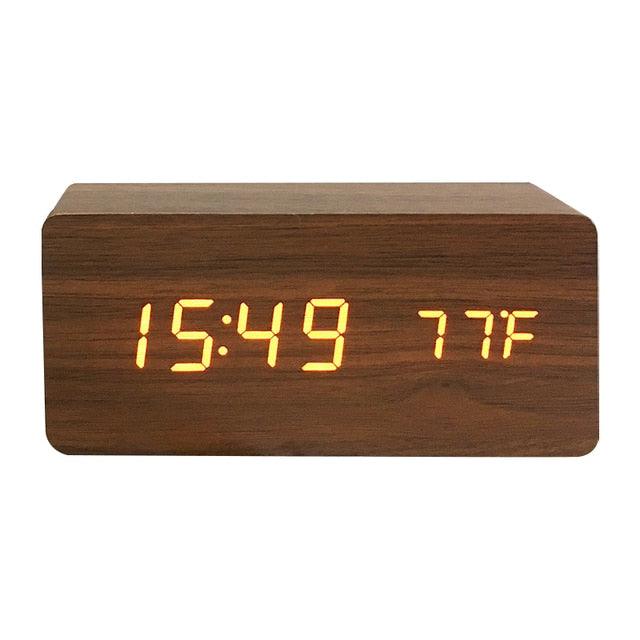 Stevvex wooden digital alarm clock with LED display, wireless charging, multiple alarms, sound control, and snooze for bedroom or office.